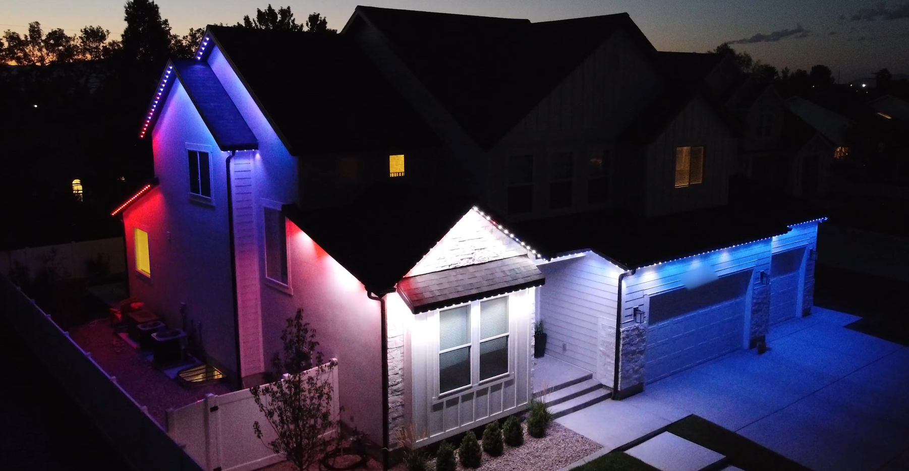 a house is lit up with red and blue lights
permanent holiday light
Utah LED Holiday Salt Lake City Christmas Festive Home